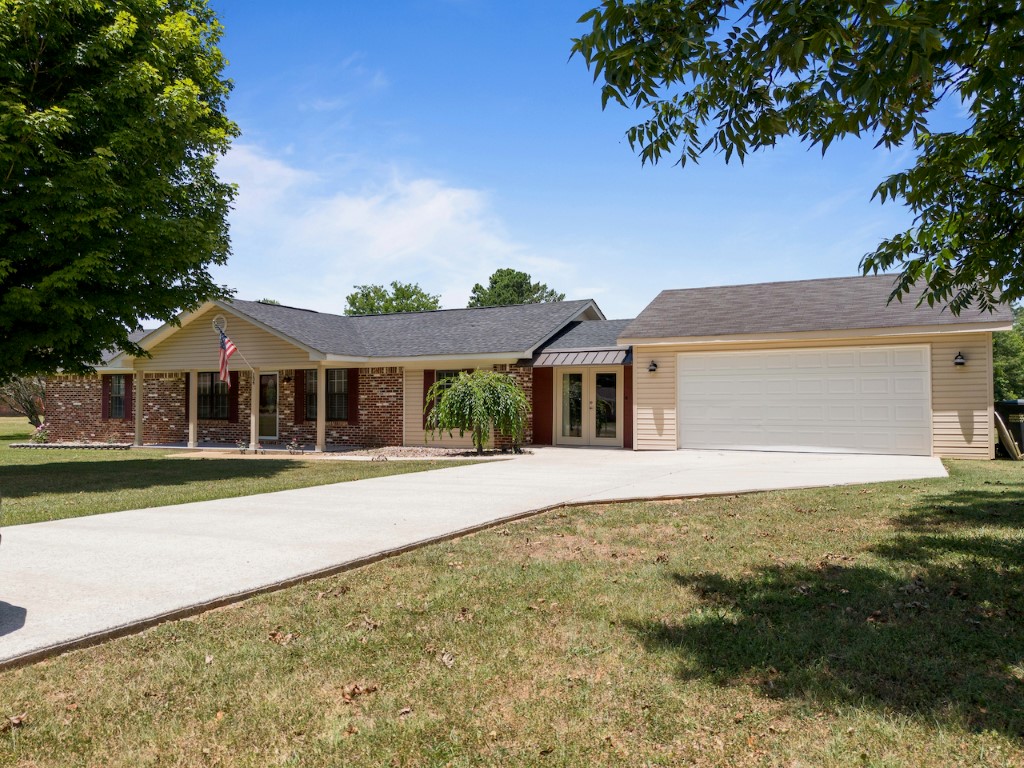 154 Cedar St: Sprawling 3-Bedroom Home on a Nicely Landscaped 1.2 Acre Lot!